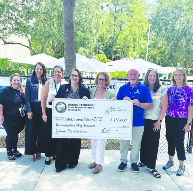 State Representative Debra Tendrich presenting a $250,000 check to Rales JFS staff