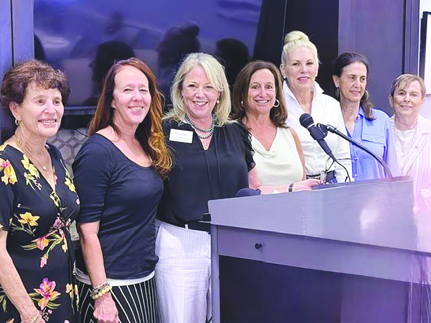 Boca Pointe Pap Corps members with CEO Sally Berenzweig at the installation podium