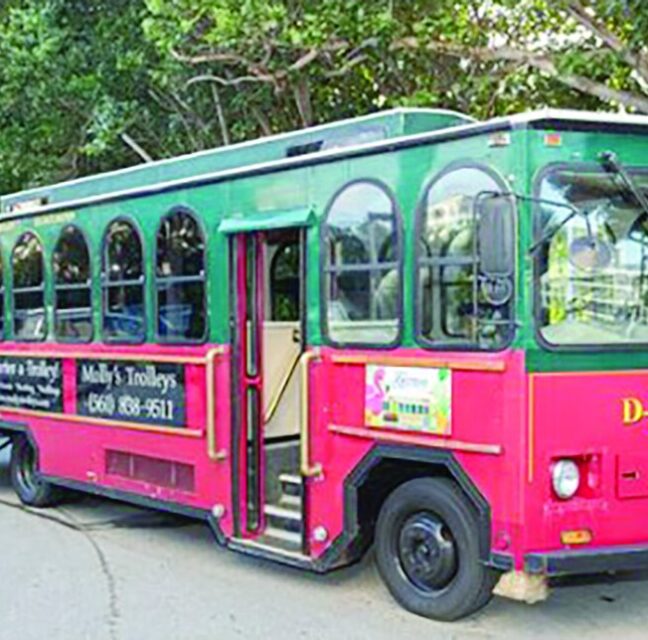 Vintage-style pink and green trolley used for the Toasts, Tastes and Trolleys tour