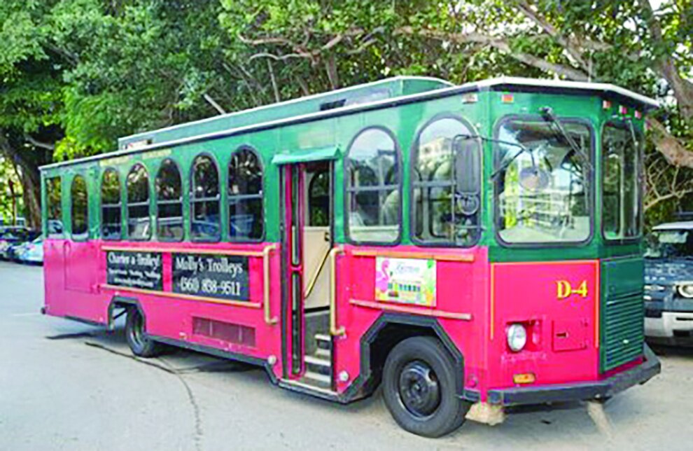 Vintage-style pink and green trolley used for the Toasts, Tastes and Trolleys tour